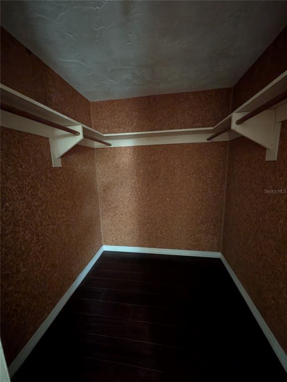 3227 Darlington Road Holiday, FL 34691 - Photo 13 of 15 a view of a room with wooden floor and a window