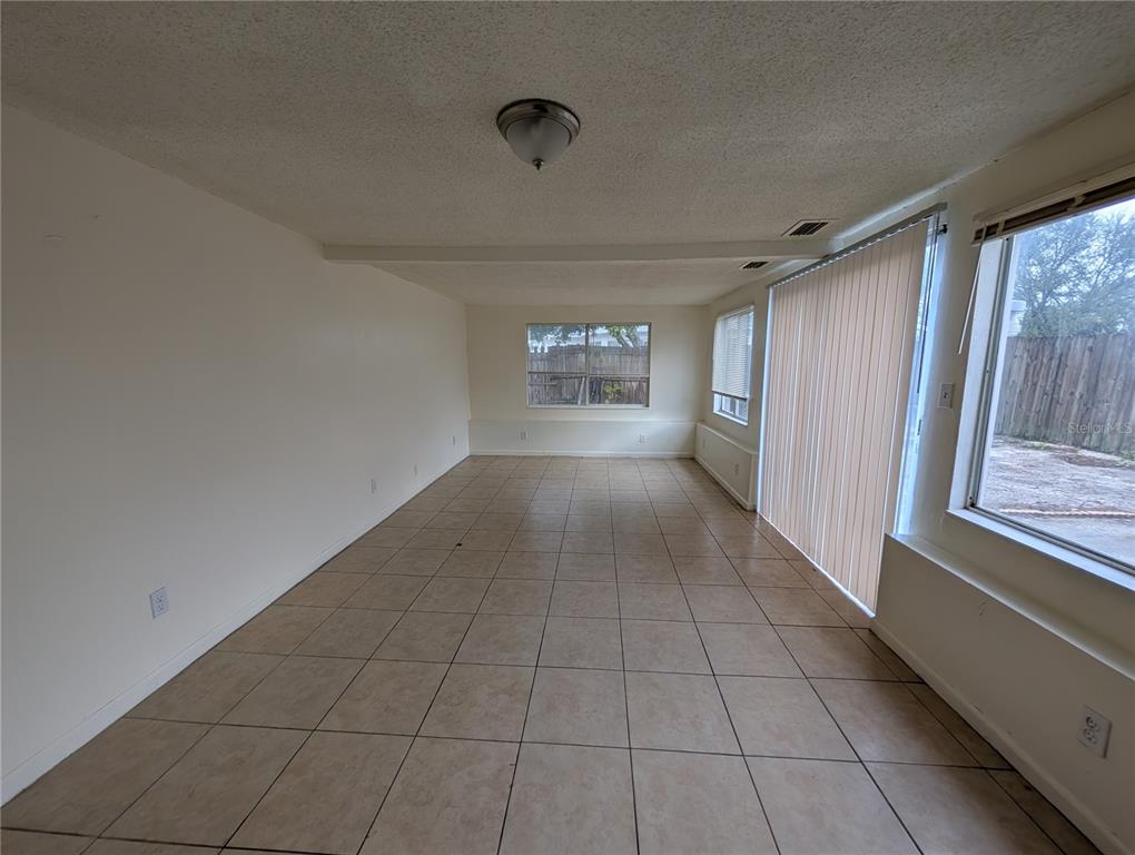 3227 Darlington Road Holiday, FL 34691 - Photo 8 of 15 a view of an empty room with a window