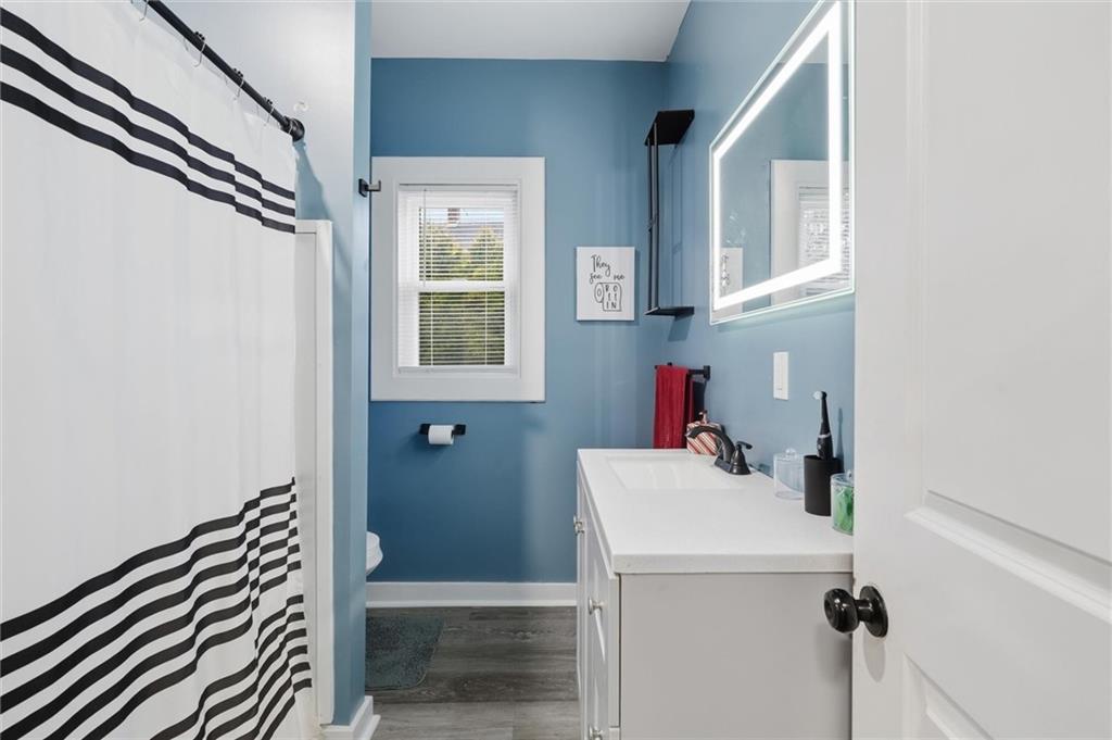244 Tyler Avenue Washington, PA 15301 - Photo 13 of 27 a bathroom with a sink and a mirror