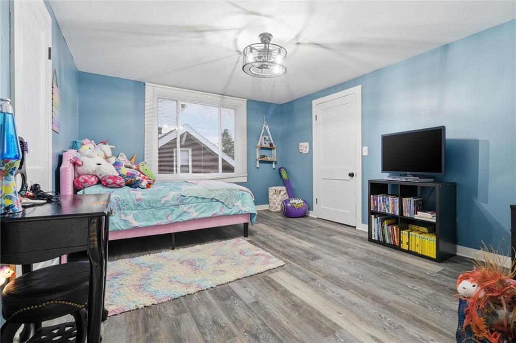 244 Tyler Avenue Washington, PA 15301 - Photo 16 of 27 a bedroom with furniture and a flat screen tv