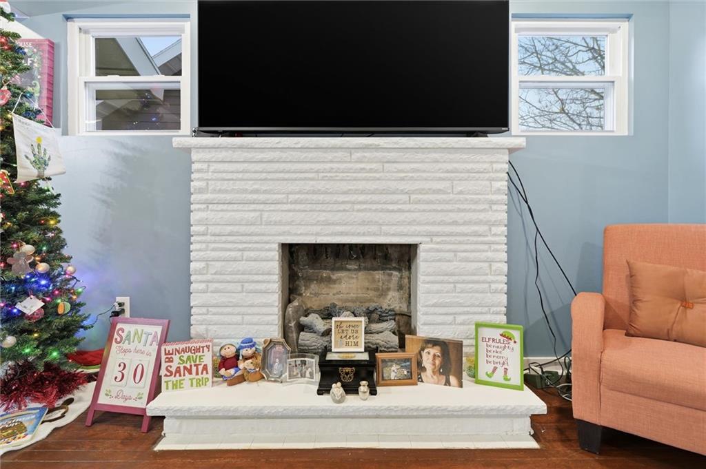 244 Tyler Avenue Washington, PA 15301 - Photo 4 of 27 a living room with furniture fireplace and flower pot