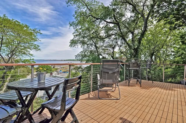 a view of a chairs and table on the wooden floor