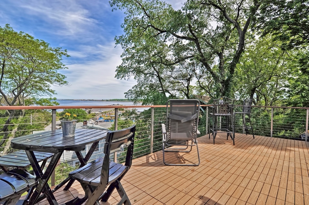 a view of a chairs and table on the wooden floor