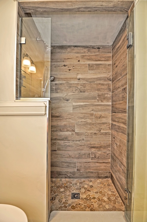 93 Granite Street, Unit 1 Rockport, MA 01966 - Photo 16 of 24 a bathroom with a shower