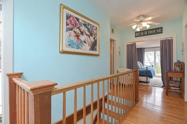 a bedroom with a bed and a table in it