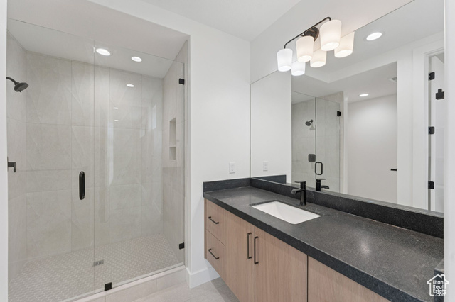 2280 East Outlaw Road, Unit 56 Kamas, UT 84036 - Photo 43 of 59 Full bathroom featuring vanity, a stall shower, recessed lighting, and tile patterned flooring