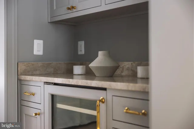 a view of cabinets and wooden floor