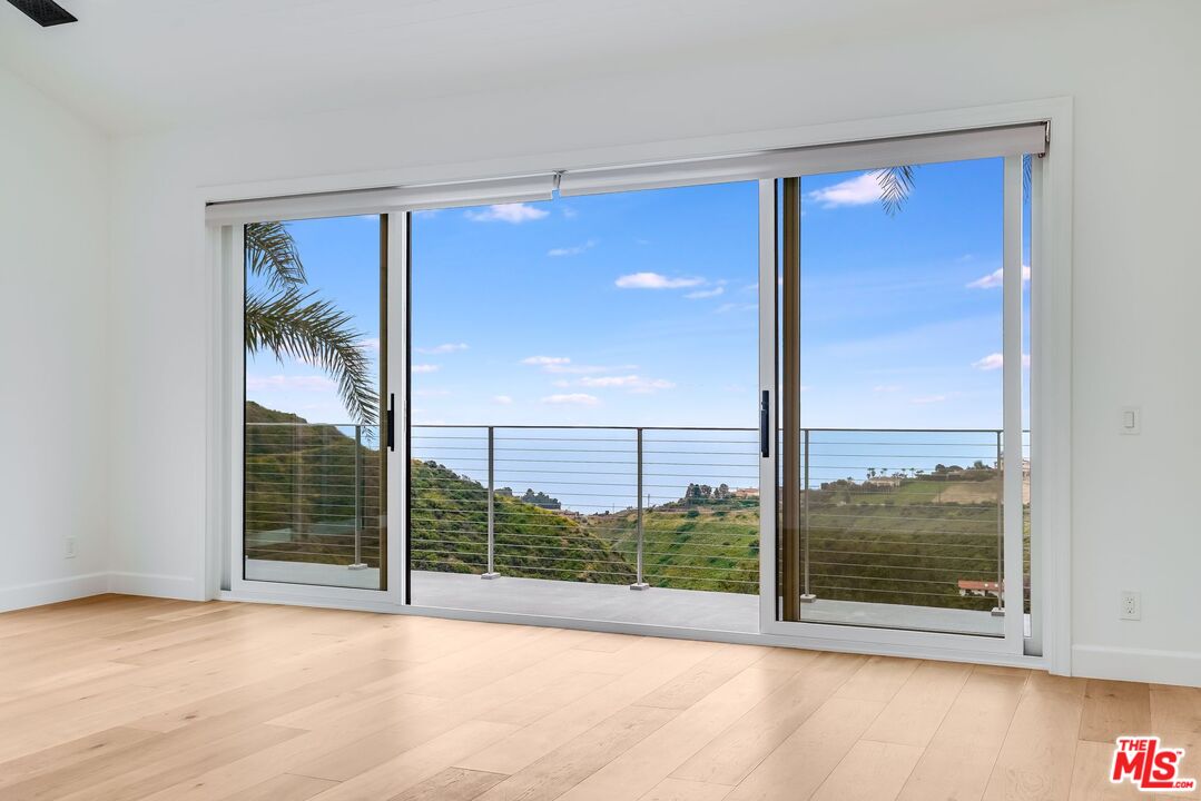 26575 Ocean View Drive Malibu, CA 90265 - Photo 23 of 39 a view of a room with a large window