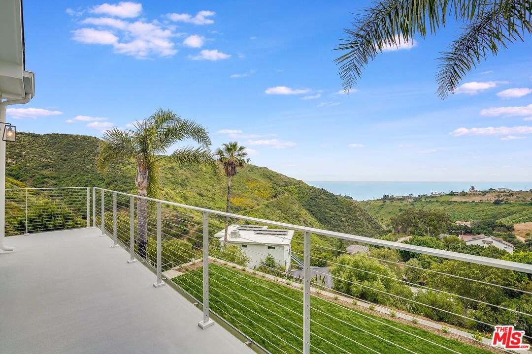 26575 Ocean View Drive Malibu, CA 90265 - Photo 29 of 39 a view of a balcony with city view