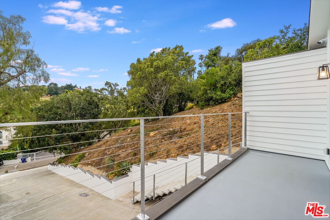 26575 Ocean View Drive Malibu, CA 90265 - Photo 36 of 39 a view of a roof deck with wooden floor and fence