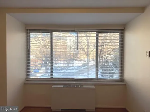 a view of a room that has a window in it