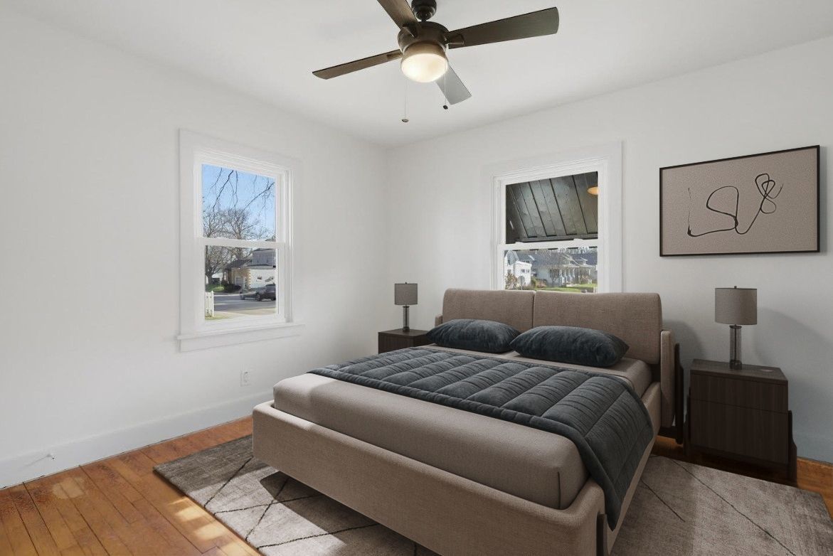 2633 16th Street Moline, IL 61265 - Photo 12 of 26 a bedroom with a bed and a window