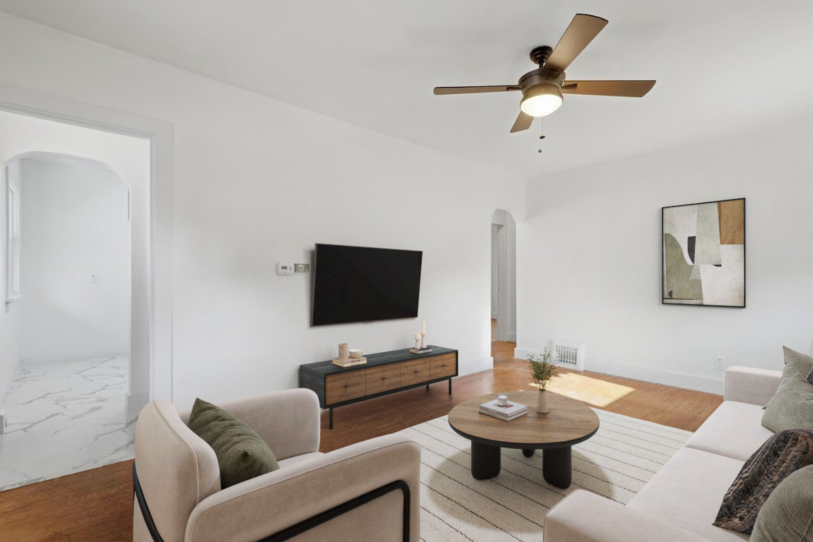 2633 16th Street Moline, IL 61265 - Photo 3 of 26 a view of a livingroom with furniture and a flat screen tv
