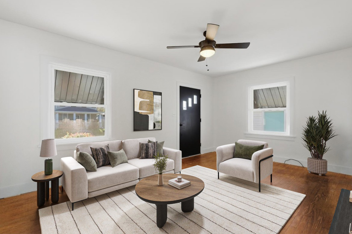 2633 16th Street Moline, IL 61265 - Photo 4 of 26 a living room with furniture and a large window