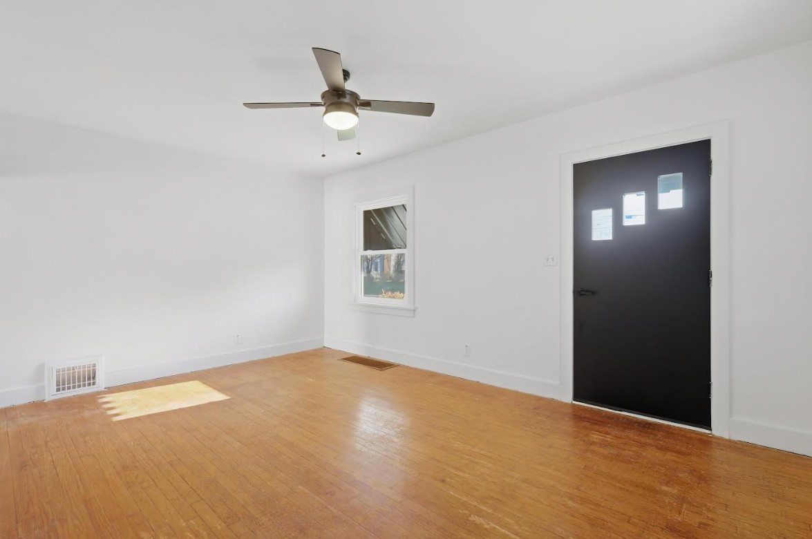 2633 16th Street Moline, IL 61265 - Photo 5 of 26 a view of an empty room with chandelier fan