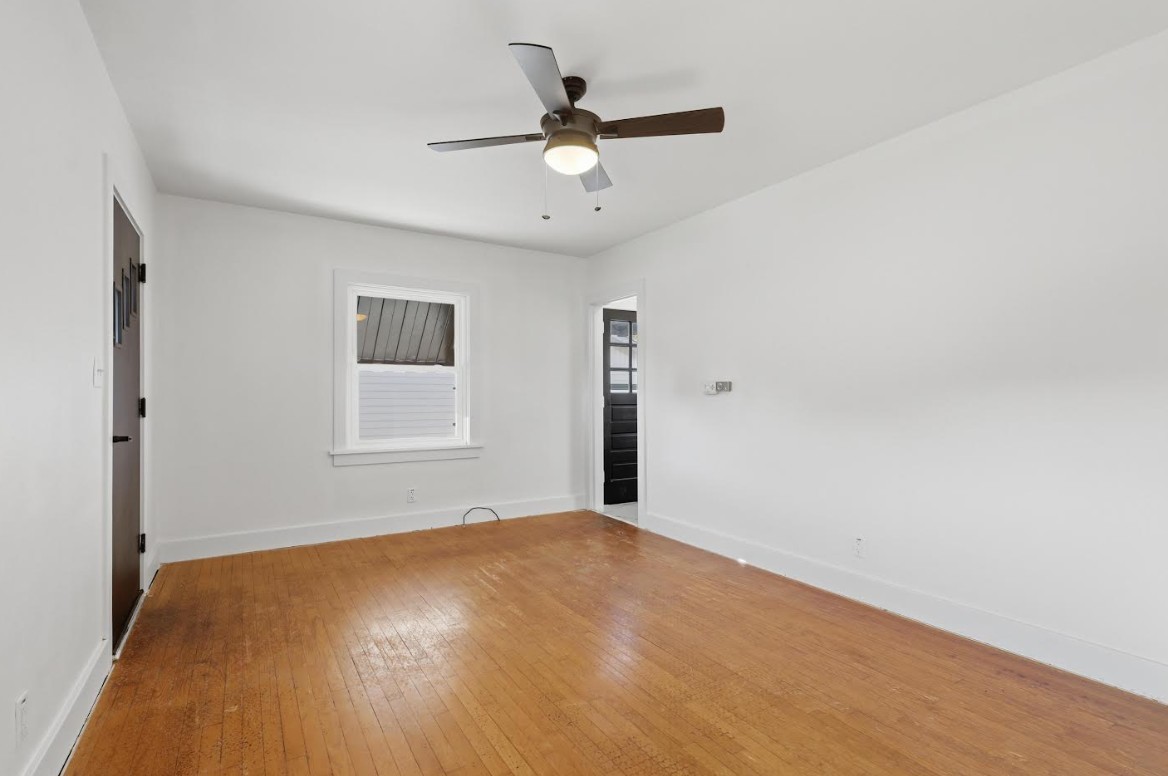 2633 16th Street Moline, IL 61265 - Photo 6 of 26 a view of an empty room with a window