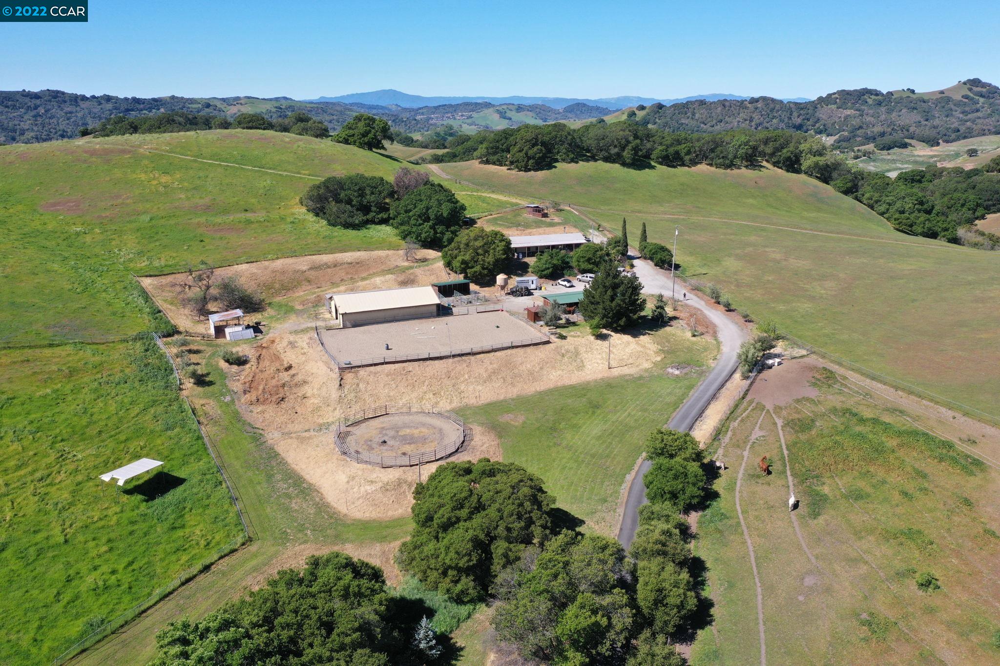 1051 Ferndale Road Martinez, CA 94553 - Photo 1 of 1 an aerial view of a house with a lake view