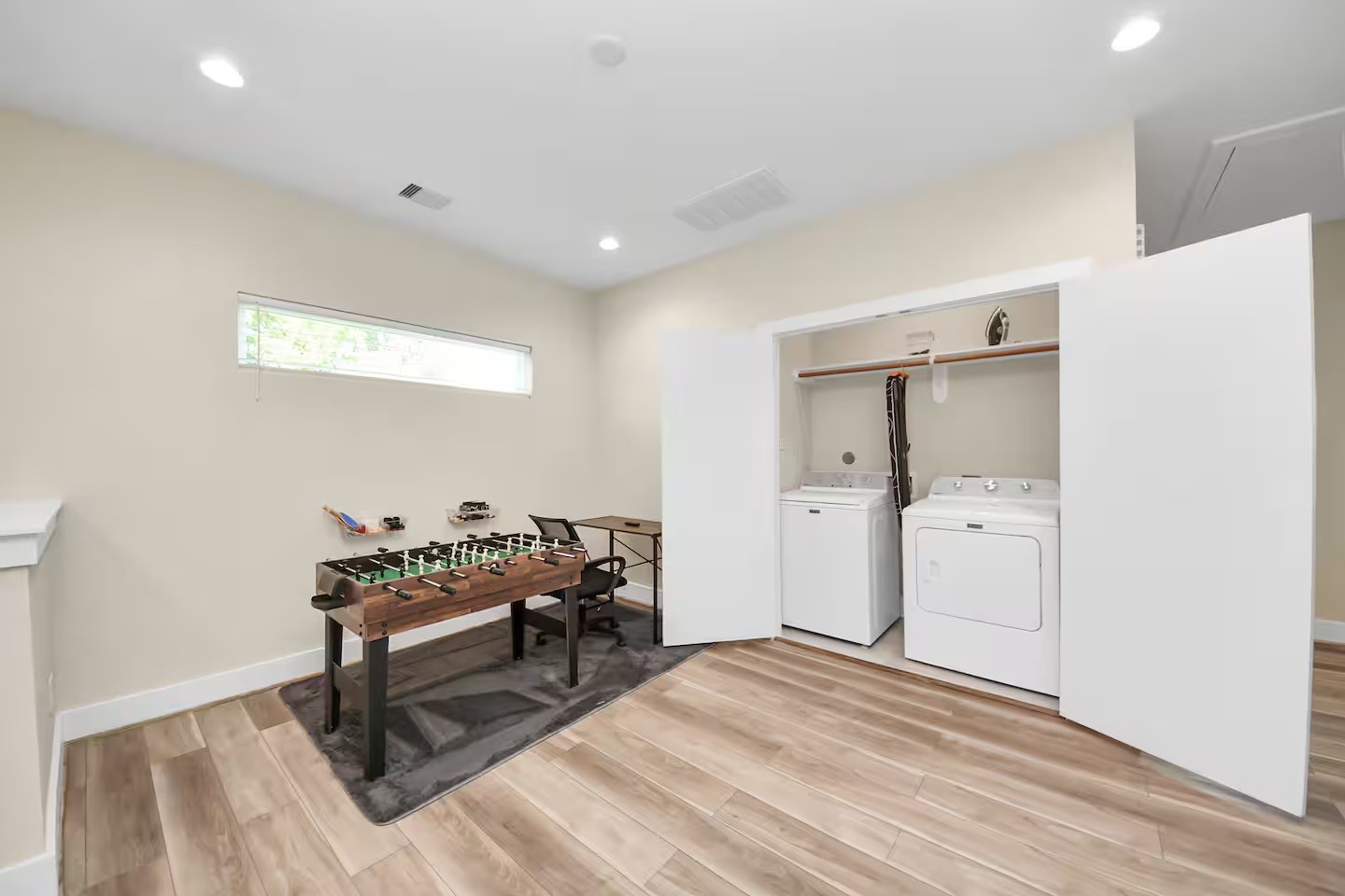 5935 Beall Street, Unit D Houston, TX 77091 - Photo 23 of 50 a bedroom with furniture and a window
