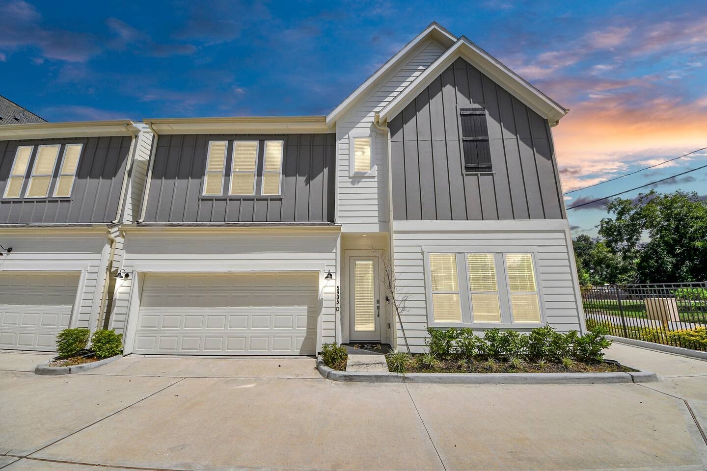 5935 Beall Street, Unit D Houston, TX 77091 - Photo 3 of 50 a front view of a house with garage