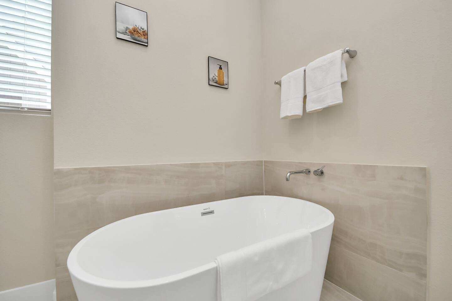5935 Beall Street, Unit D Houston, TX 77091 - Photo 34 of 50 a white bath tub sitting in a bathroom