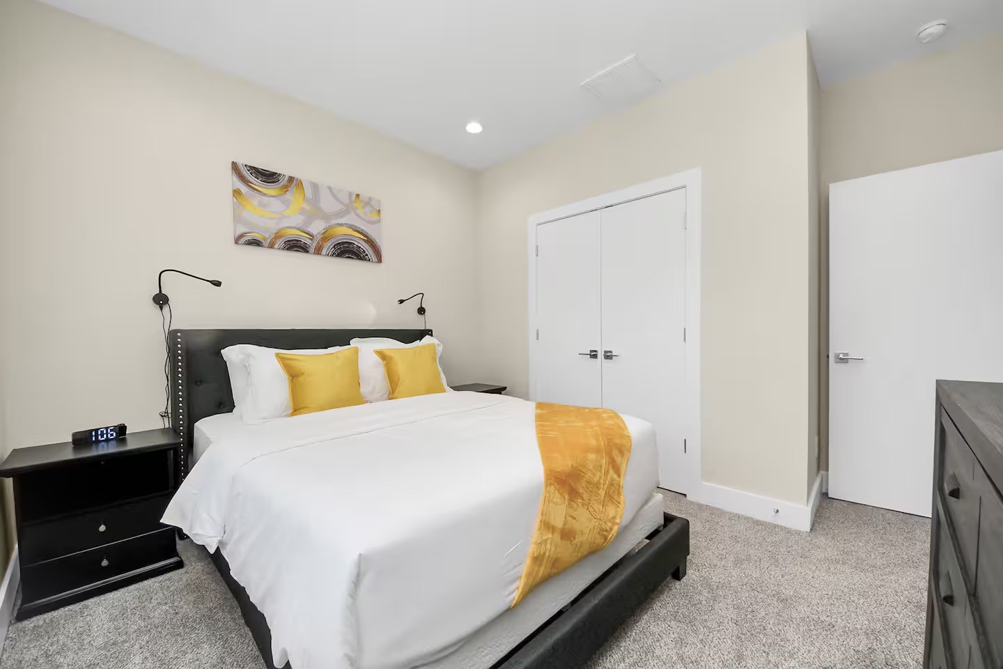 5935 Beall Street, Unit D Houston, TX 77091 - Photo 41 of 50 a bedroom with a bed and painting on the wall