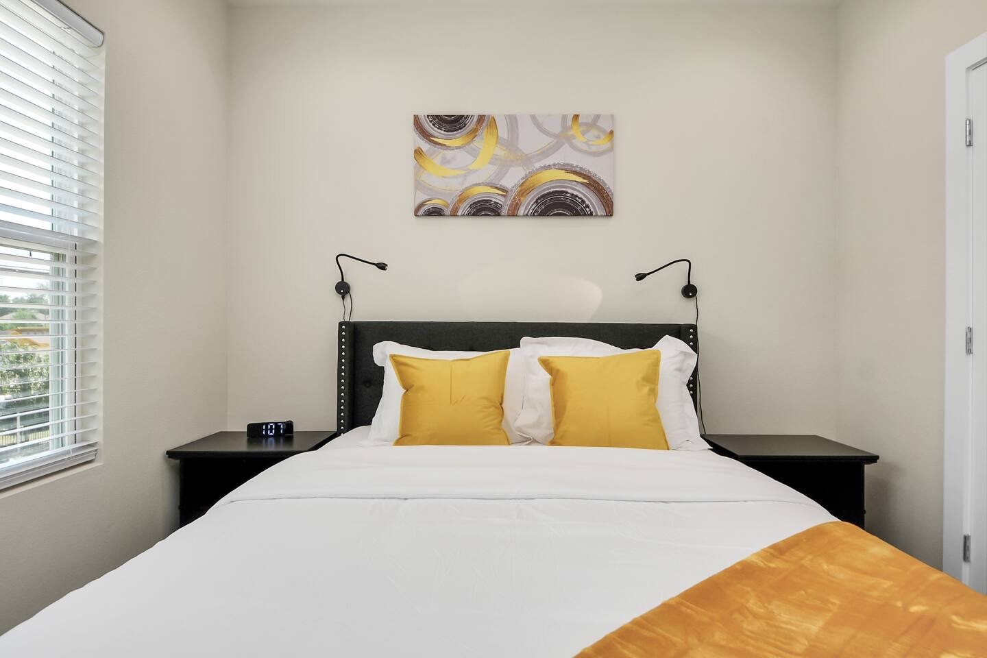 5935 Beall Street, Unit D Houston, TX 77091 - Photo 44 of 50 a bedroom with a bed and painting on the wall