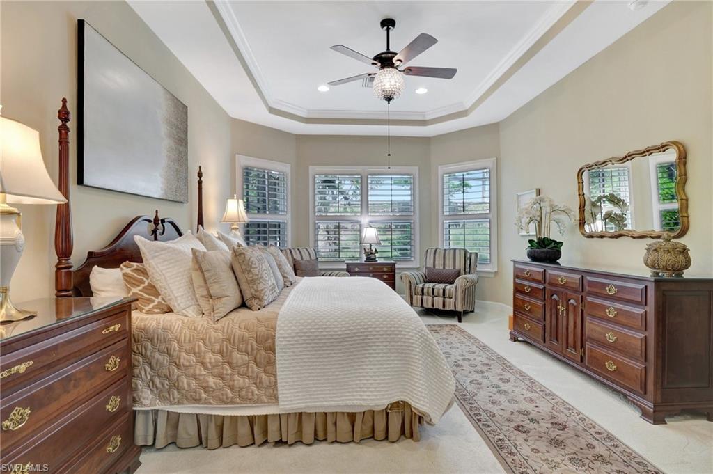 8558 Maggiore Court Naples, FL 34114 - Photo 22 of 50 a living room with furniture and a large window
