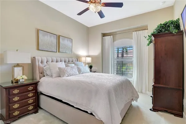 a bathroom with a granite countertop toilet sink and shower
