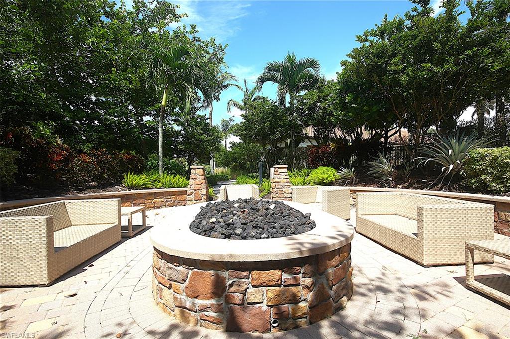 8558 Maggiore Court Naples, FL 34114 - Photo 43 of 50 a view of a swimming pool with a patio
