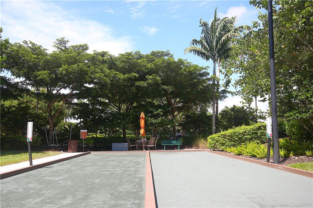 8558 Maggiore Court Naples, FL 34114 - Photo 44 of 50 a view of a park with potted plants and large trees