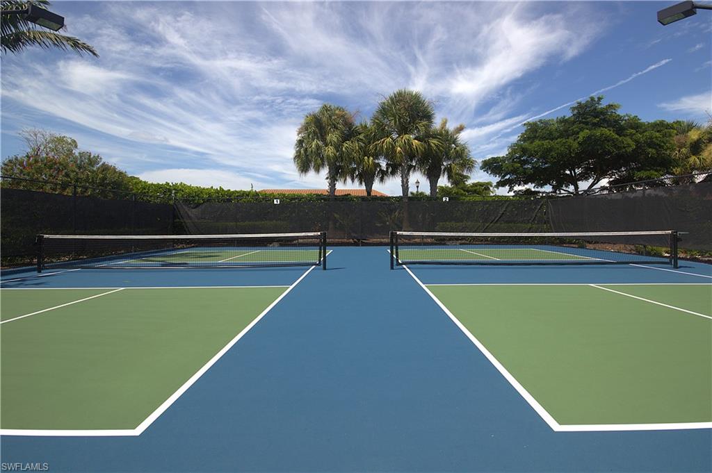 8558 Maggiore Court Naples, FL 34114 - Photo 48 of 50 a view of swimming pool with seating area and mountain view