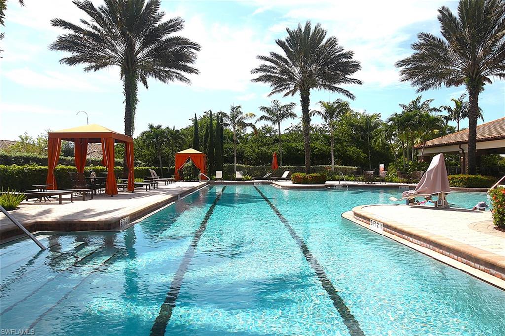 8558 Maggiore Court Naples, FL 34114 - Photo 49 of 50 a view of a house with swimming pool and sitting area