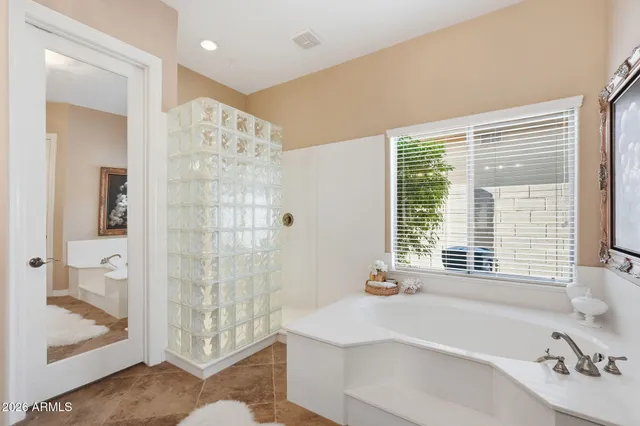 a view of a swimming pool with a yard