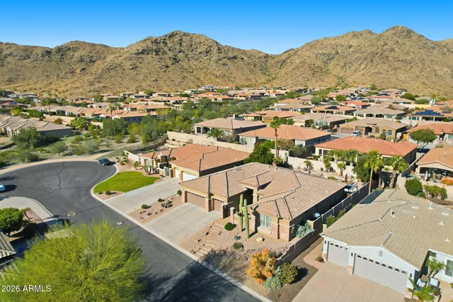 an aerial view of a house with a outdoor space