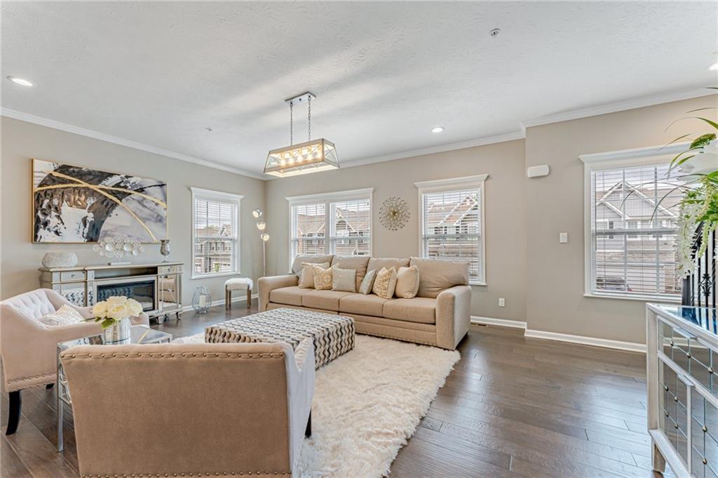 331 Trinity Way Wexford, PA 15090 - Photo 14 of 50 a living room with furniture and a large window