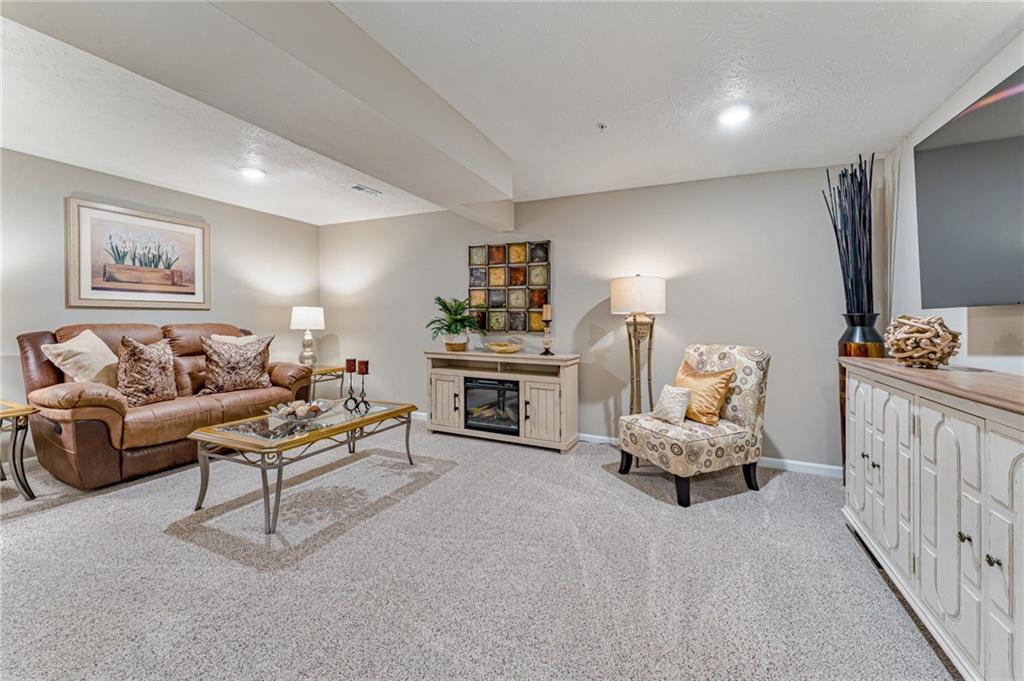 331 Trinity Way Wexford, PA 15090 - Photo 22 of 50 a spacious bedroom with a bed and a couch