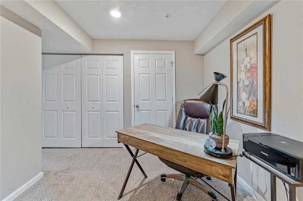 331 Trinity Way Wexford, PA 15090 - Photo 23 of 50 a work room with furniture and wooden floor