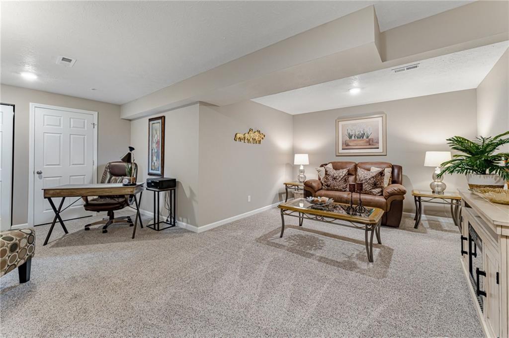 331 Trinity Way Wexford, PA 15090 - Photo 24 of 50 a living room with furniture and a potted plant