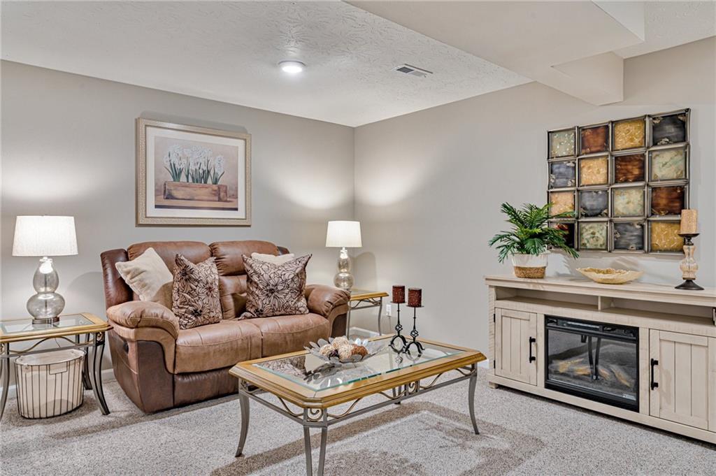 331 Trinity Way Wexford, PA 15090 - Photo 26 of 50 a living room with furniture and a potted plant