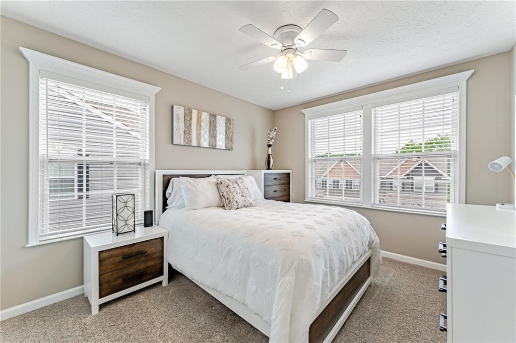 331 Trinity Way Wexford, PA 15090 - Photo 36 of 50 a bedroom with a bed and a window