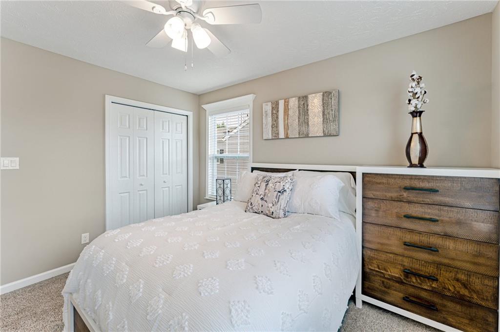 331 Trinity Way Wexford, PA 15090 - Photo 38 of 50 a large white bed in a white room