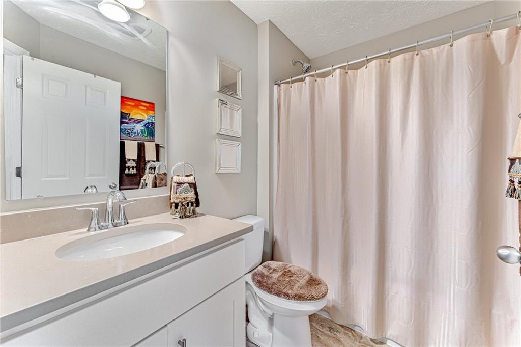 331 Trinity Way Wexford, PA 15090 - Photo 39 of 50 a bathroom with a sink and a mirror