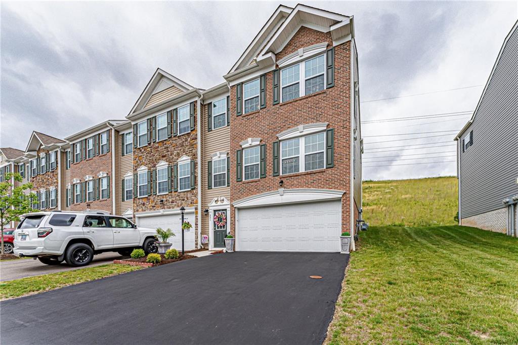 331 Trinity Way Wexford, PA 15090 - Photo 41 of 50 a view of a car park in front of a building
