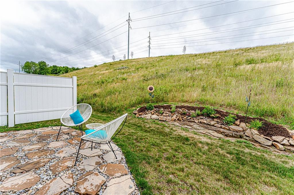 331 Trinity Way Wexford, PA 15090 - Photo 42 of 50 a view of a chair and table in backyard
