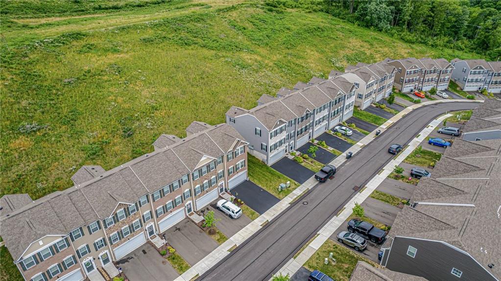 331 Trinity Way Wexford, PA 15090 - Photo 47 of 50 a view of a balcony with two chairs and a table