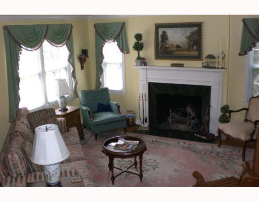 939 Freeport Road Natrona Heights, PA 15065 - Photo 2 of 8 Living Room. English country inspired. Hardwood floors, gas fireplace custom marbelized painted , Custom drapery ,