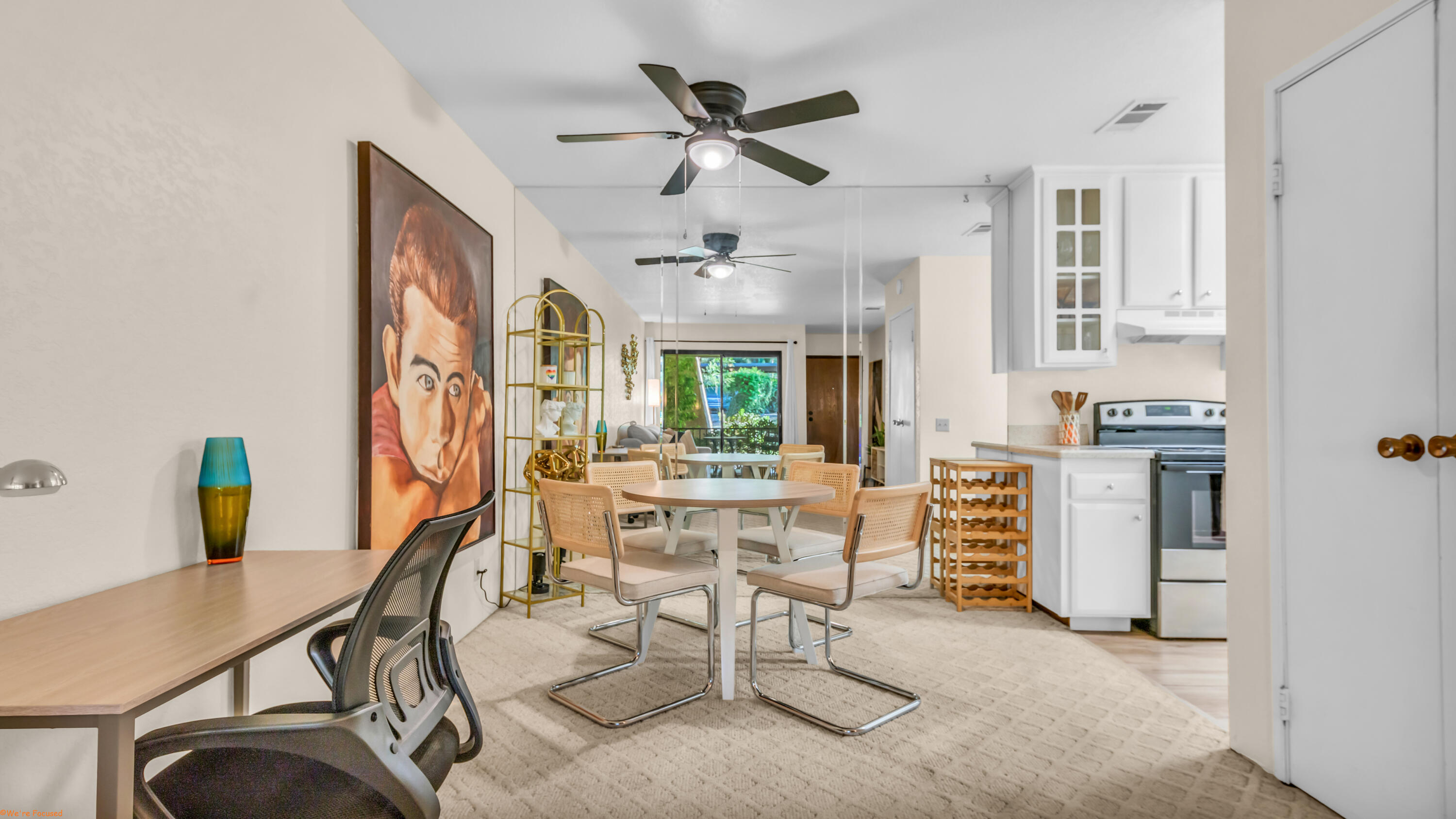 2800 Los Felices Circle North, Unit 107 Palm Springs, CA 92262 - Photo 11 of 18 a work room with furniture and a window