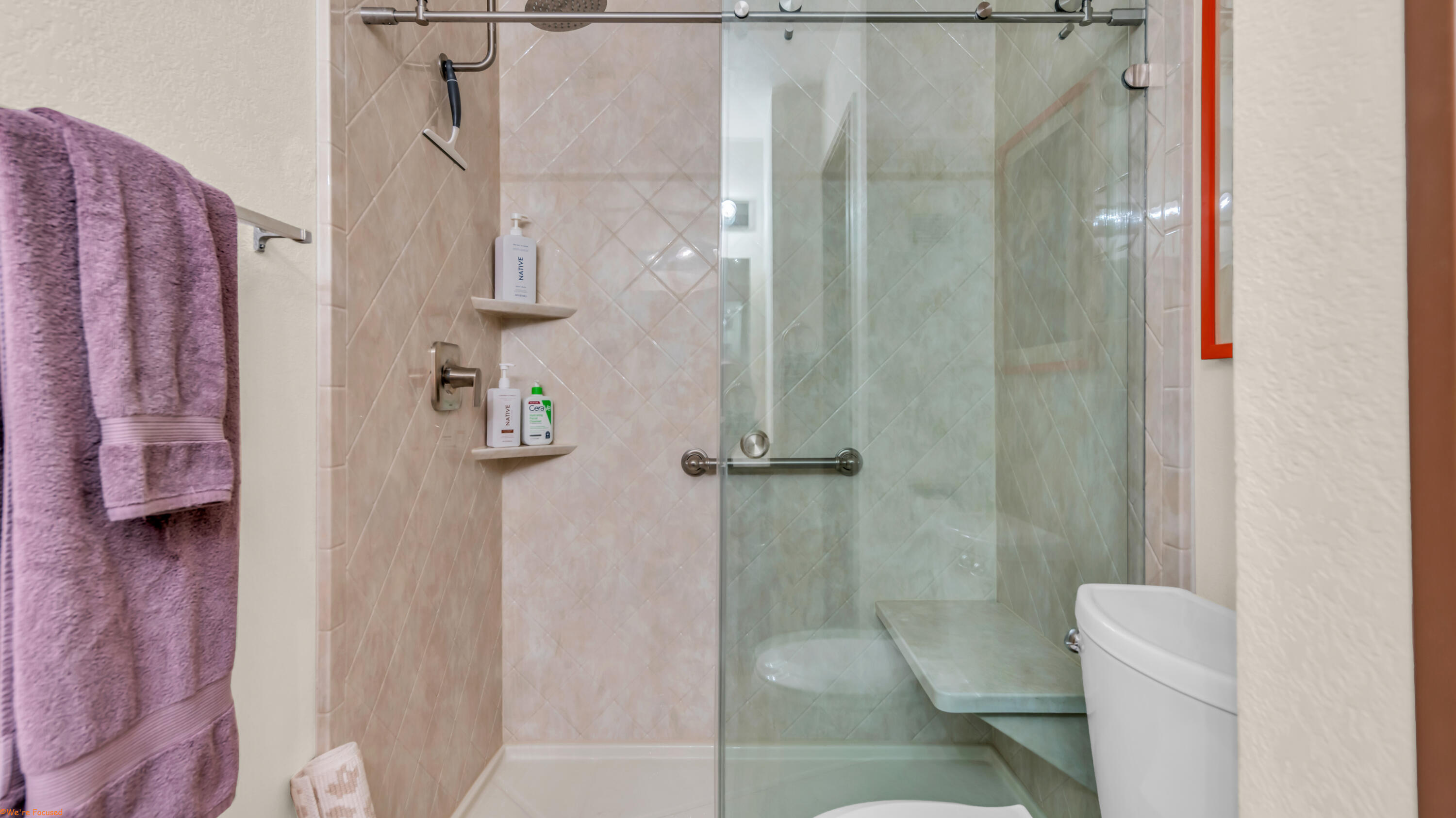 2800 Los Felices Circle North, Unit 107 Palm Springs, CA 92262 - Photo 13 of 18 a bathroom with a shower and toilet