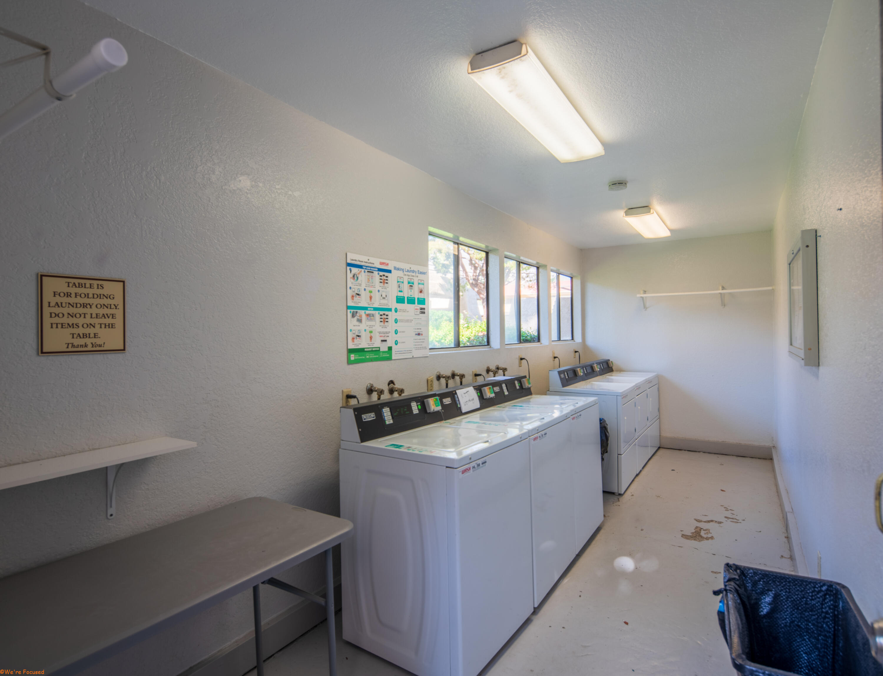 2800 Los Felices Circle North, Unit 107 Palm Springs, CA 92262 - Photo 18 of 18 a kitchen with a stove and a refrigerator