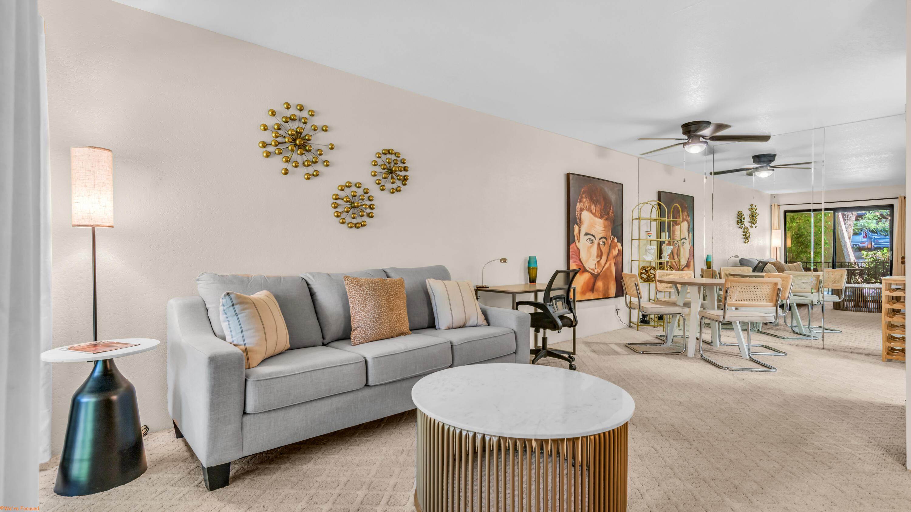 2800 Los Felices Circle North, Unit 107 Palm Springs, CA 92262 - Photo 3 of 18 a living room with furniture and a table
